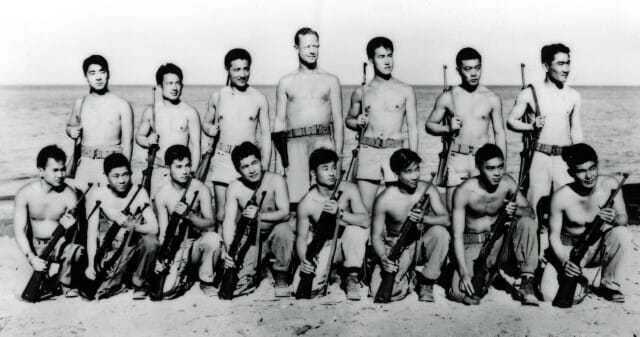 Black and white photo of a group of young men.